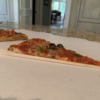 Italian Fresh Pizza - two slices of pizza on a table - Pizza Near Me - Black Diamond, Washington Italian Fresh Pizza - two slices of pizza on a table - Pizza Near Me - Black Diamond, Washington