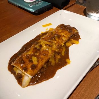 Cantina Laredo - Enchilada. They'll make them with flour tortillas if corn isn't your thing. - Mexican Near Me - Branson, Missouri Cantina Laredo - Enchilada. They'll make them with flour tortillas if corn isn't your thing. - Mexican Near Me - Branson, Missouri