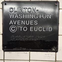 MTA - Clint / Washington Ave Subway Station - Braille and raised letters on column for visual impaired