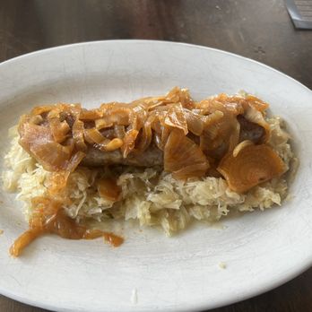 Schnitzel Time - Brat with onions and sauerkraut. Yep homemade brat very tasty. - German Near Me - Palm Coast, Florida Schnitzel Time - Brat with onions and sauerkraut. Yep homemade brat very tasty. - German Near Me - Palm Coast, Florida