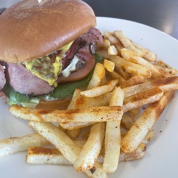 First Bite - Bustrami w/ Fries - Succulent burger topped with grilled pastrami and swiss cheese, served with lettuce, tomato, onion, pickles, and mayo - Desserts Near Me - Marysville, California