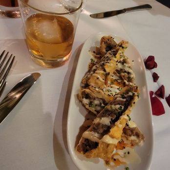 Sullivan's Steakhouse - Woodford Reserve bourbon & Cheesesteak egg rolls - Steakhouses Near Me - Tucson, Arizona