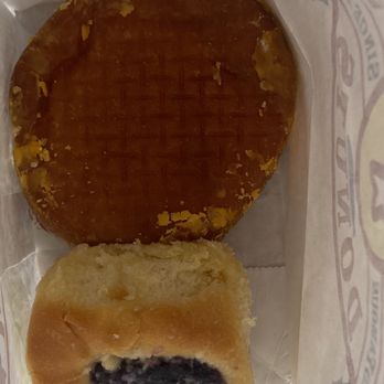 Round Rock Donuts - Blueberry kolache and our upside down filled donut with frosting side face down. - Bakeries Near Me - Round Rock, Texas Round Rock Donuts - Blueberry kolache and our upside down filled donut with frosting side face down. - Bakeries Near Me - Round Rock, Texas