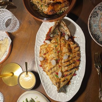 aya - Chicken Kabsa Tagine, Branzino, Aspragus - Middle Eastern Near Me - Milwaukee, Wisconsin aya - Chicken Kabsa Tagine, Branzino, Aspragus - Middle Eastern Near Me - Milwaukee, Wisconsin
