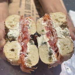 Lox bagels with capers, tomato and onions Lox bagels with capers, tomato and onions