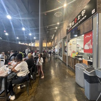 KTown - people sitting at tables in a restaurant - Korean Near Me - Cary, North Carolina