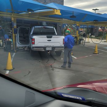 Carmel Car Wash - Festive employee - Car Wash Near Me - Rockwall, Texas Carmel Car Wash - Festive employee - Car Wash Near Me - Rockwall, Texas