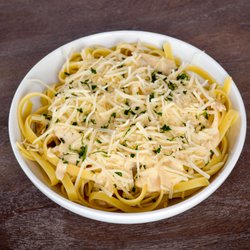 Z'mariks Noodle Cafe - Z'alfredo Fettuccine noodles smothered with our creamy alfredo sauce, sprinkled with romano cheese and fresh italian parsley