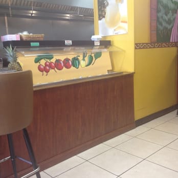 Tacos Express - Garnish bar with a variety of hot sauce - Mexican Near Me - Orlando, Florida Tacos Express - Garnish bar with a variety of hot sauce - Mexican Near Me - Orlando, Florida