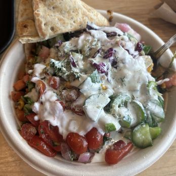 CAVA - CAVA chicken bowl with tomato and onion, cucumbers, yogurt and dill, and much more! - Mediterranean Near Me - Pearland, Texas