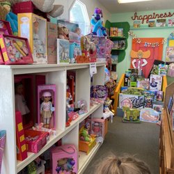 Ruben's Wood Craft And Toys - Dolls, games, and workbooks are in this area.
