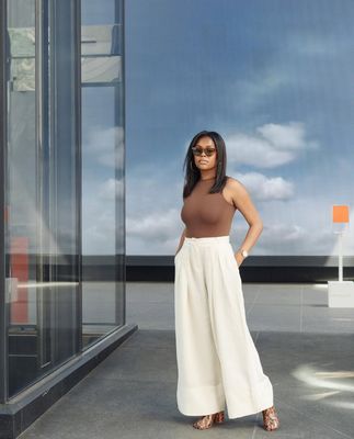 Shorten pants + taper waist - Our 'Shorten Pants' service is just $35. Our 'Taper Waist' service is just $35. The photos display the before and after of our work. Precise hemming and waist tailored to elevate your style and comfort.
