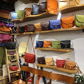 Ibiz - One wall of purse designs - Leather Goods Near Me - Rome, RM