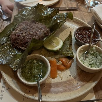 Suerte - Goat barbacoa is a shared plate where you can make lots of tacos! It was absolutely delicious - Mexican Near Me - Austin, Texas