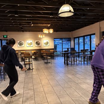 Starbucks - two women walking in a coffee shop - Coffee & Tea Near Me - Davis, California Starbucks - two women walking in a coffee shop - Coffee & Tea Near Me - Davis, California