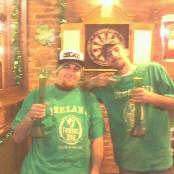 Finnegan's Wake - two men in green shirts - Irish Pub Near Me - Springfield, Missouri
