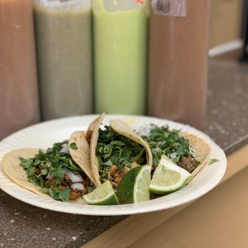 Avenida Cantina - a plate of tacos on a counter - Bars Near Me - Yakima, Washington Avenida Cantina - a plate of tacos on a counter - Bars Near Me - Yakima, Washington