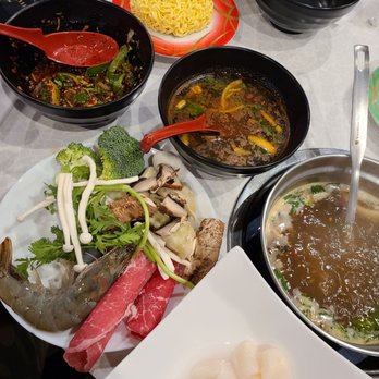 JuicyPot - Szechuan broth, scallops, shrimp, beef, veggies, ramen noodles and sauces - Hot Pot Near Me - Orlando, Florida JuicyPot - Szechuan broth, scallops, shrimp, beef, veggies, ramen noodles and sauces - Hot Pot Near Me - Orlando, Florida