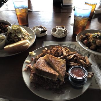 Hatfield's Goode Grub - Left to right, pulled pork sandwich, smoked corned beef Reuben, and catfish with cheese grits.  All quite delicious. - Food Trucks Near Me - Cleveland, Ohio