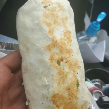 Middleterranean - Hand held burrito with meat only at bottom - Middle Eastern Near Me - Addison, Illinois Middleterranean - Hand held burrito with meat only at bottom - Middle Eastern Near Me - Addison, Illinois
