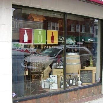 In Fine Spirits - a car parked in front of a wine shop - Beer, Wine & Spirits Near Me - Chicago, Illinois