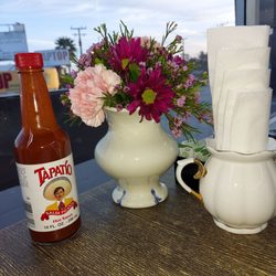 Coffee Time - Table Decore Fresh Flowers My Breakfast was so good!!!! The Freshly Brewed tea was beyond .Our waitress was so  Accommodating!!!!