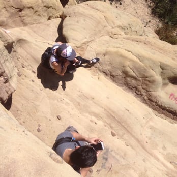Corral Crest Canyon - Shanon and Morison sitting on a rock, Snapchat got busy this very day loading their videos - Hiking Near Me - Malibu, California Corral Crest Canyon - Shanon and Morison sitting on a rock, Snapchat got busy this very day loading their videos - Hiking Near Me - Malibu, California