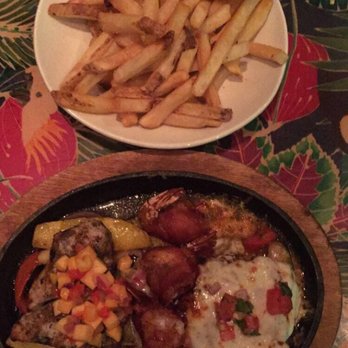 Rainforest Cafe - Parilla Yucatán ($23.99) and safari fries ($2.99) - American Near Me - Ontario, California Rainforest Cafe - Parilla Yucatán ($23.99) and safari fries ($2.99) - American Near Me - Ontario, California