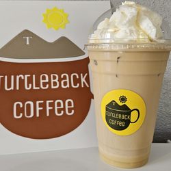 Turtleback Coffee - White Chocolate with whipped cream and white chocolate Drizzzle.
