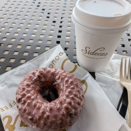 Strawberry buttermilk donut and latte Strawberry buttermilk donut and latte