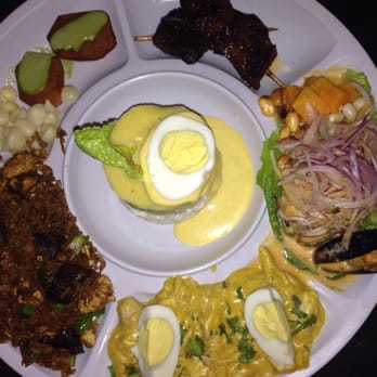 La Guitarra con Sazon - Sampling plate (top clockwise; anticuchos, ceviche, aji gallina, chaufa. center: causa) - Latin American Near Me - Houston, Texas La Guitarra con Sazon - Sampling plate (top clockwise; anticuchos, ceviche, aji gallina, chaufa. center: causa) - Latin American Near Me - Houston, Texas