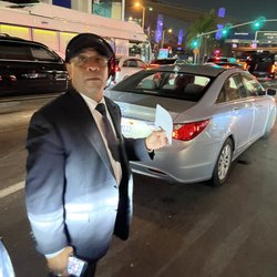 Alliance Limousine - just standing outside of his vehicle for 20 minutes blocking traffic