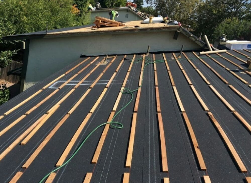 Slide of Falcon Roofing