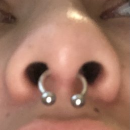 Crooked and low septum piercing Crooked and low septum piercing