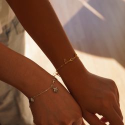 Matching charm bracelets
