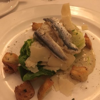 Lahaina Grill - Caesar salad, split. Get it with the anchovies and mash them up for an umami bomb salad. - Seafood Near Me - Lahaina, Hawaii Lahaina Grill - Caesar salad, split. Get it with the anchovies and mash them up for an umami bomb salad. - Seafood Near Me - Lahaina, Hawaii