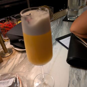 Mademoiselle Raw Bar + Grill - The lavender cocktail: not bad. 4/5 - Live/Raw Food Near Me - Toronto, Ontario