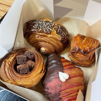 Black Box Bakery - NYC bagel with scallion cream cheese, hot honey sausage roll, Nutella spaceship, and strawberry croissant dipped in chocolate - Bakeries Near Me - Edgewater, Colorado