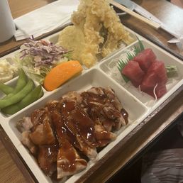 3 choice bento box with tempura, chicken teriyaki and sashimi 3 choice bento box with tempura, chicken teriyaki and sashimi