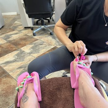 PN Nails - Dee Dee finishing up my pedicure. She was so through and it was so enjoyable. - Nail Salons Near Me - Jackson, Tennessee