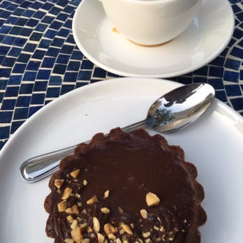 Cupitol Coffee & Eatery - Nutella chocolate tart with a smooth cappuccino to cap off the meal. Mmmmm... - Coffee & Tea Near Me - Evanston, Illinois Cupitol Coffee & Eatery - Nutella chocolate tart with a smooth cappuccino to cap off the meal. Mmmmm... - Coffee & Tea Near Me - Evanston, Illinois