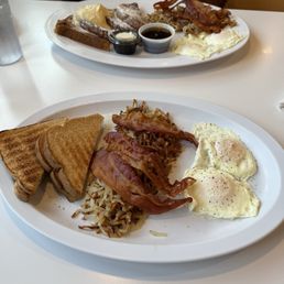My amazing breakfast self explanatory and my wife's French toast platter behind