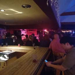 people sitting at the bar people sitting at the bar