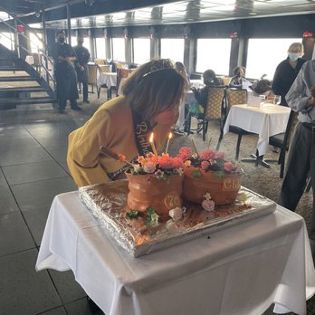 City Cruises - Mother blowing out candles - Venues & Event Spaces Near Me - New York, New York
