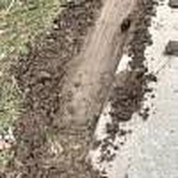 Spa Builders of Kentucky - Damages on other side of driveway at drop off location