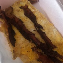 This is supposed to be a bacon and egg platter smh cold eggs and burnt bacon