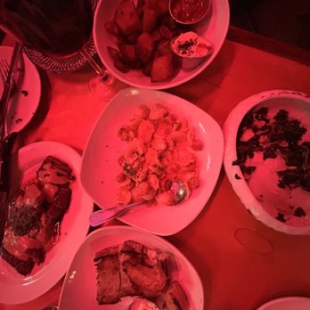 Phlight - a table with plates of food and utensils - Wine Bars Near Me - Whittier, California Phlight - a table with plates of food and utensils - Wine Bars Near Me - Whittier, California