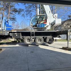 Arbormax Tree Service - Crane in Driveway
