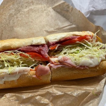 Downstairs Deli - a sub sandwich with lettuce, tomato, and cheese - Delis Near Me - Breckenridge, Colorado Downstairs Deli - a sub sandwich with lettuce, tomato, and cheese - Delis Near Me - Breckenridge, Colorado