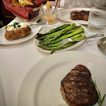 Gene & Georgetti - Complementary bread basket, potato supreme, asparagus, 14oz New York Strip, 12oz Filet Mignon 12oz. - Italian Near Me - Chicago, Illinois Gene & Georgetti - Complementary bread basket, potato supreme, asparagus, 14oz New York Strip, 12oz Filet Mignon 12oz. - Italian Near Me - Chicago, Illinois